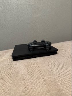 Sony PlayStation 4 Slim with Controller and 7 Games