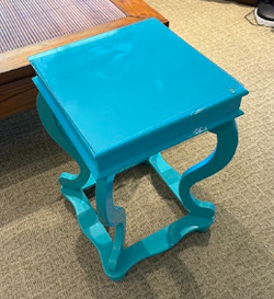 Turquoise glass-top side table