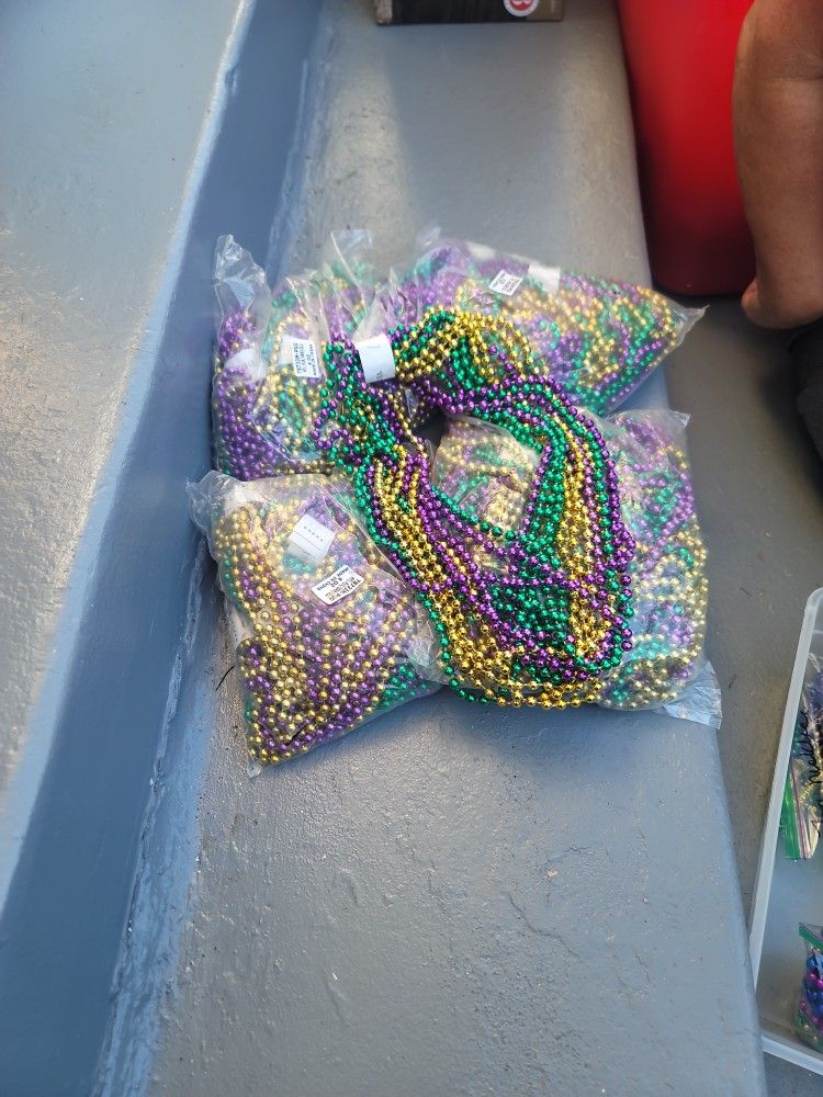 18 Dozen Mardi Gras Beads $65