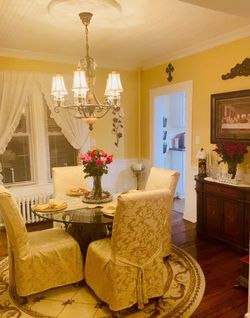 glass table with parson chairs / console table and new slip covers for chairs