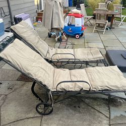 Pair of two adjustable reclining patio lounge chairs with sunbrella cushion
