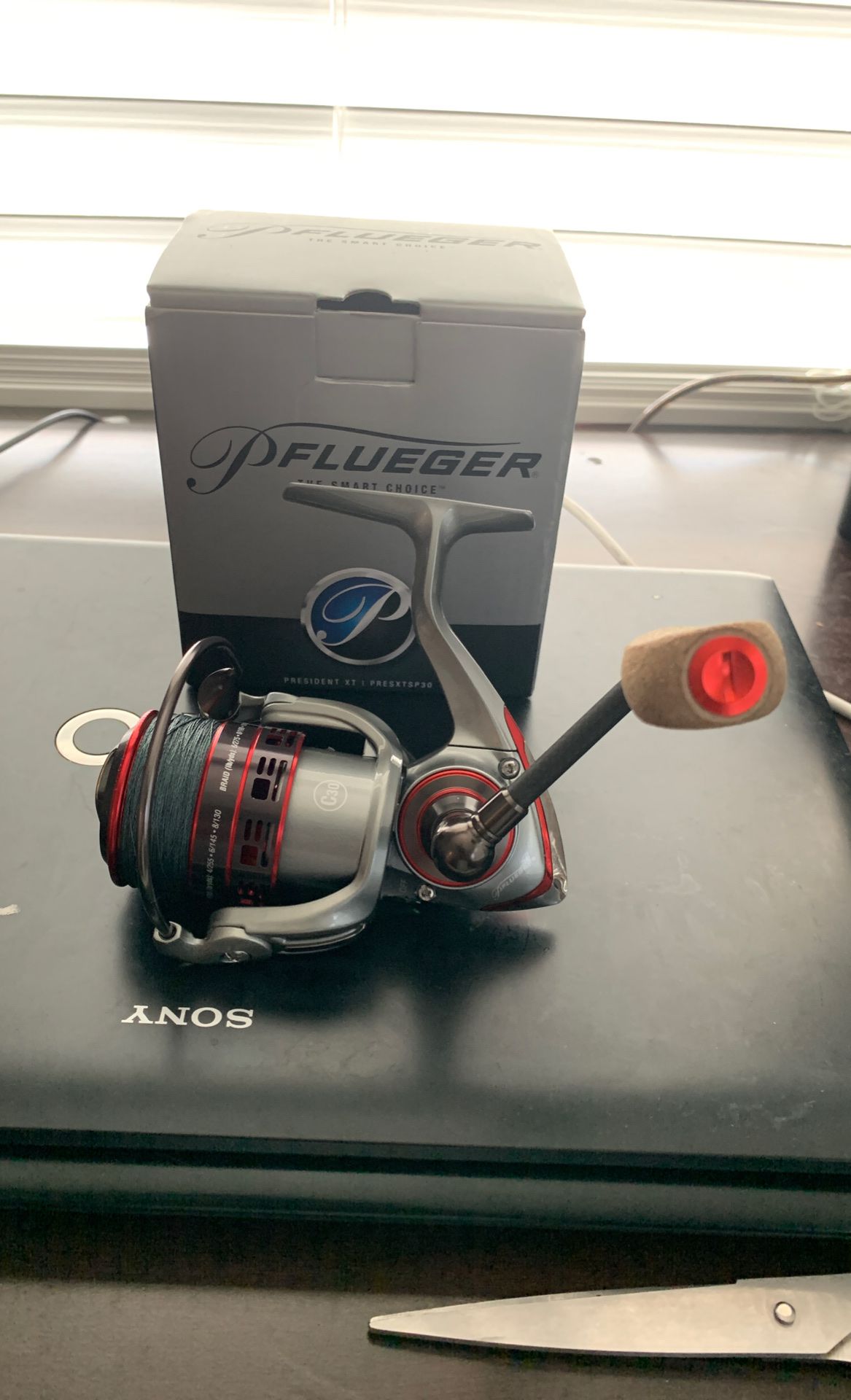 Brand new Pflueger president XTSP30 fishing reel with 15 lb braided line