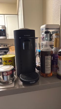 Vertuo Plus Deluxe Coffee and Espresso Machine in Black