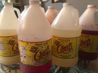 7 snow cone flavors (big bottles) 7 botellas grandes de savor para raspas