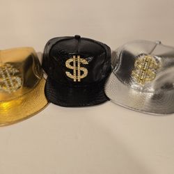 Hats Set of 3 Gold/Silver/Black Metal Gold Dollar Sign With Rhinestones Adjustable Caps. (New)