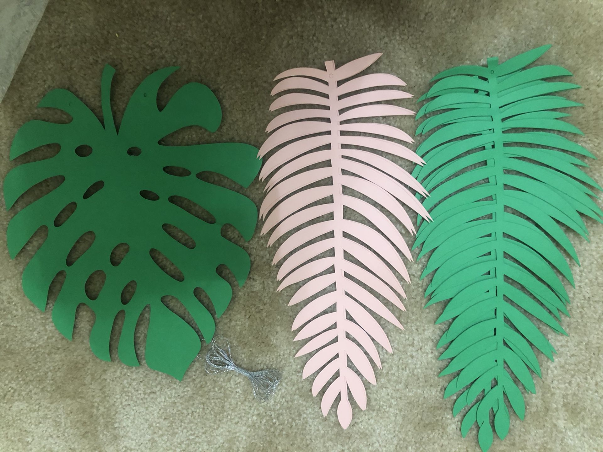 Artificial tropical palm leaves and artificial tree leaves....