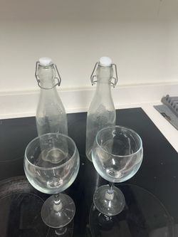 Glass Swing-Top Bottles (2) + Wine Glasses (2) – Good Condition