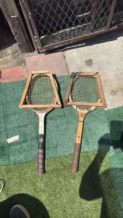 Two vintage tennis rackets