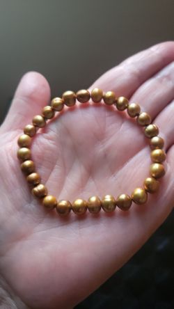 Natural Pearl Bracelet .This is a golden baroque pearl stretch bracelet. 