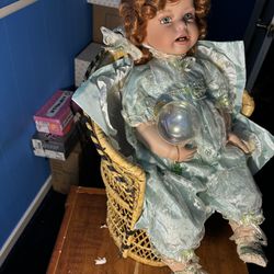 Porcelain Doll With Chair