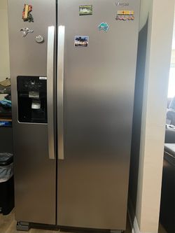 Whirlpool side by side refrigator