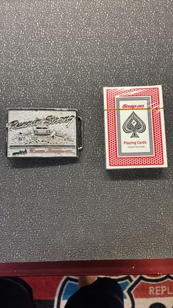 Snap-on Tools, a deck of playing cards and a belt buckle