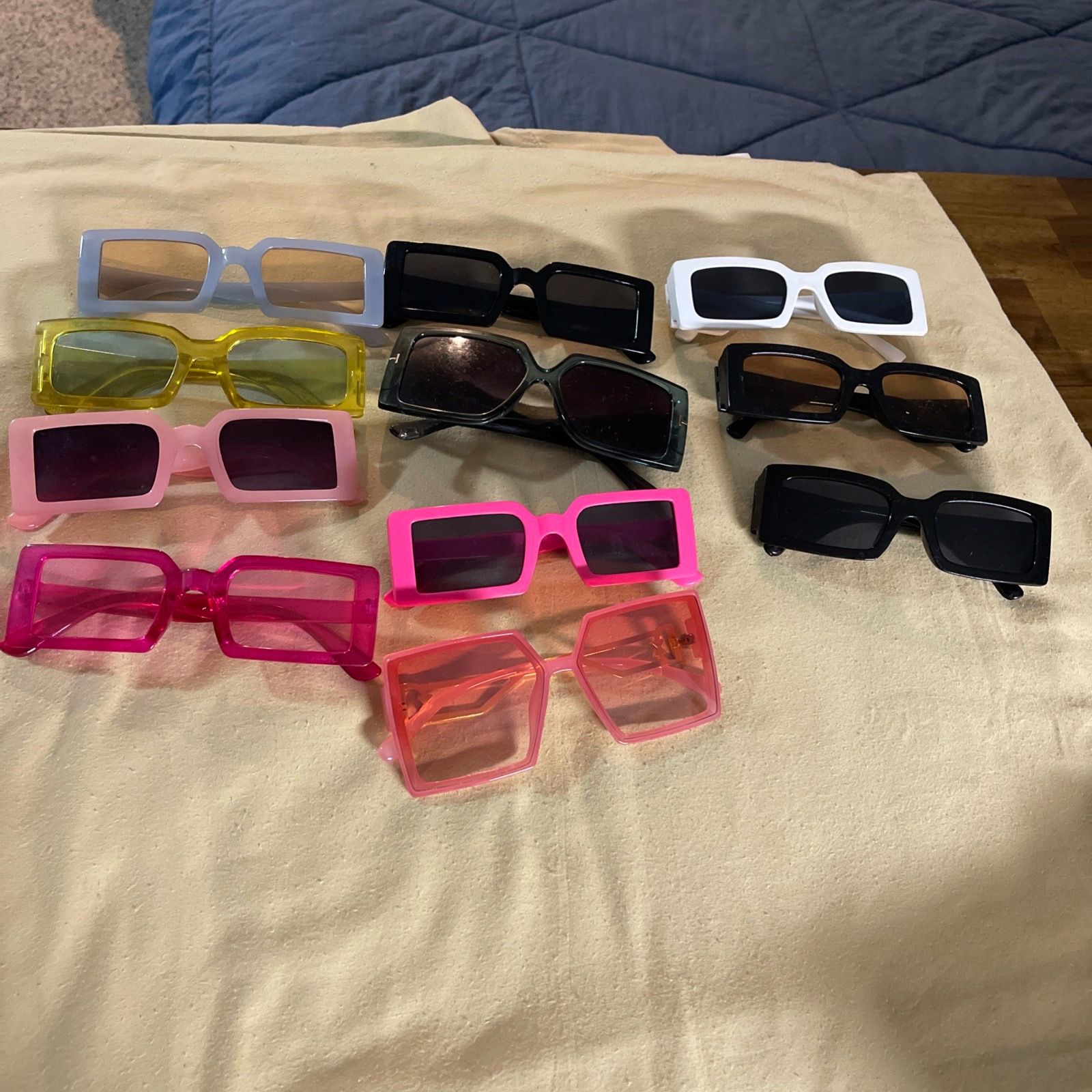 11 pairs of sunglasses