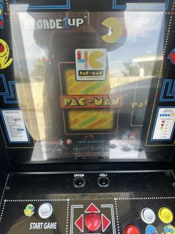 Arcade1Up Pac-Man arcade machine with riser and seat cover