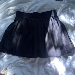 Black pleated tennis skirt