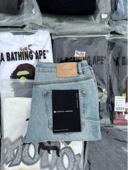 Purple jeans size 36, brand new with bag.