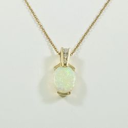 14 K Gold pendant with Australian Opal and Diamonds 