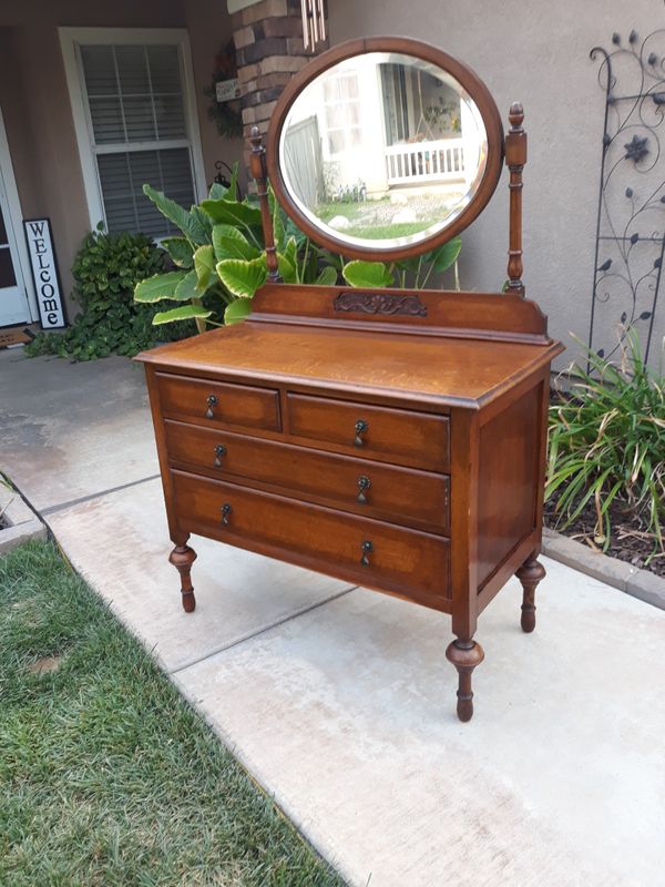 ANTIQUE 4DR. SINGLE DRESSER OR VANITY W/ OVAL BEVELED MIRROR (CIRCA