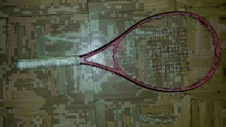 4 good tennis rackets.