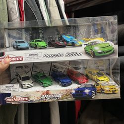 Porshe and Japanese toy cars
