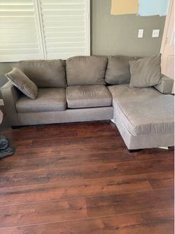 Couch free. No rips. Needs a cleaning.