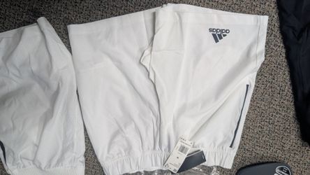 New Adidas men's athletic shorts size medium and hat bundle