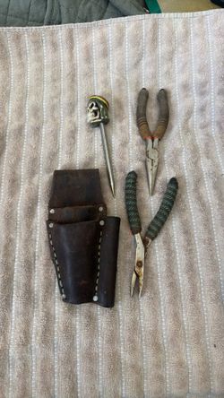 Tuna spike and hand sewn leather sheath