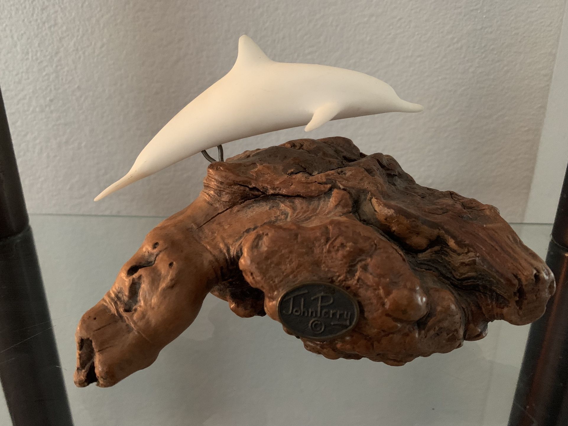John Perry sculpture Dolphin on driftwood