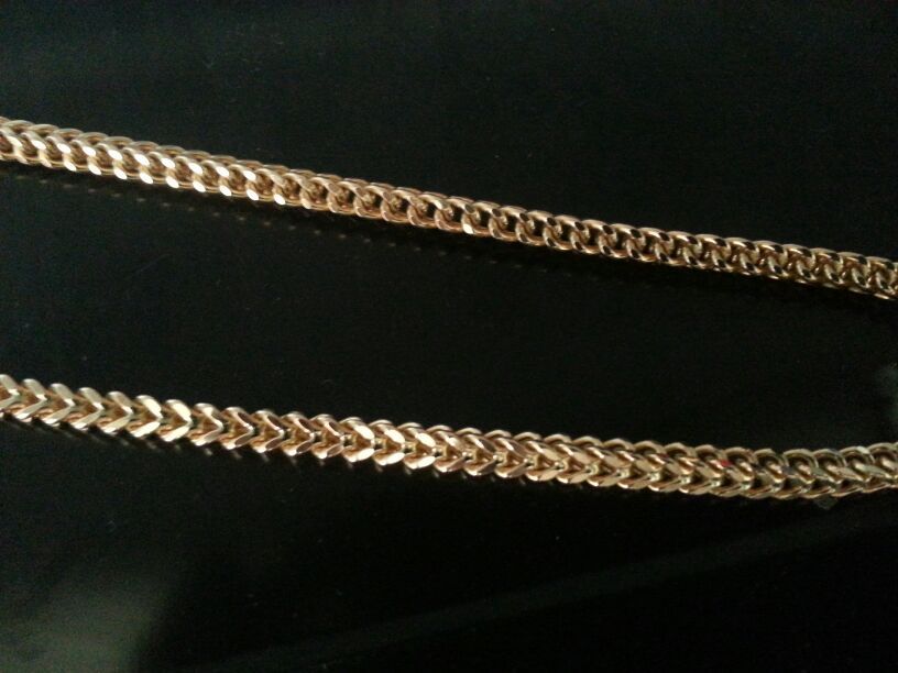 30 inch designer Chain with charm 10k gold 100 grams of gold