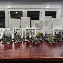 Hawthorne Village Halloween Universal Studio Monsters 11 Piece Village with Spooky Wire Trees. Most of these pieces have a certificate of authenticity