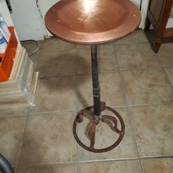 Copper and iron bird bath