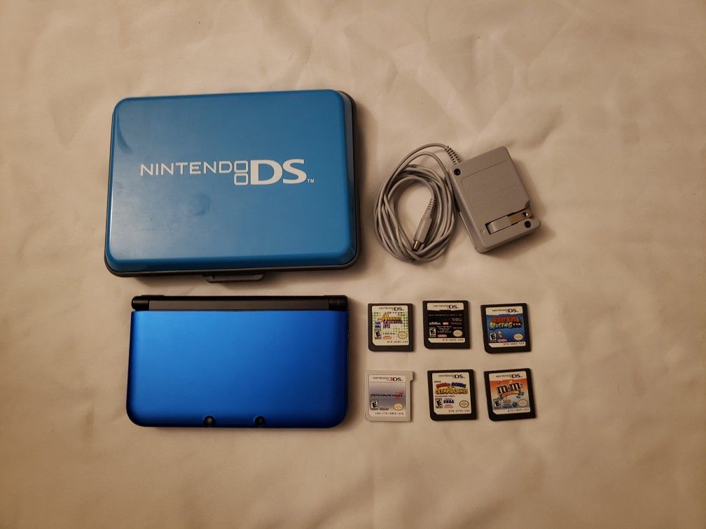 Nintendo 3ds XL with 6 games and hard shell carrying case