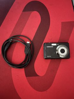 Samsung SL102 Digital Camera (10.2 MP) + Wire