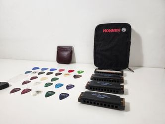 Lot of 4 Hohner Hot Metal Harmonica & Hohner Hoodoo Blue Harmonicas With Case & 26 Assorted Guitar Picks & Cases