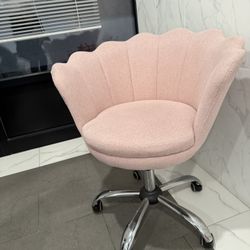 Pinkish Swivel chair