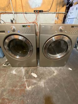 LG washer and gas dryer, front load. Can be side by side or stacked