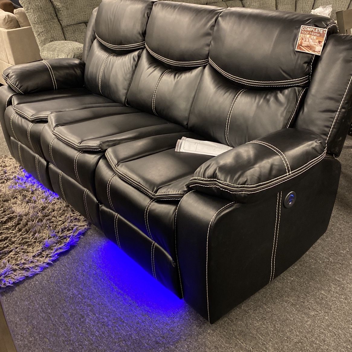Brand New Clearance Power Black Recliner With Usb And Led Lights. Two Sofas Clearance Priced At 1699 Was 2700.