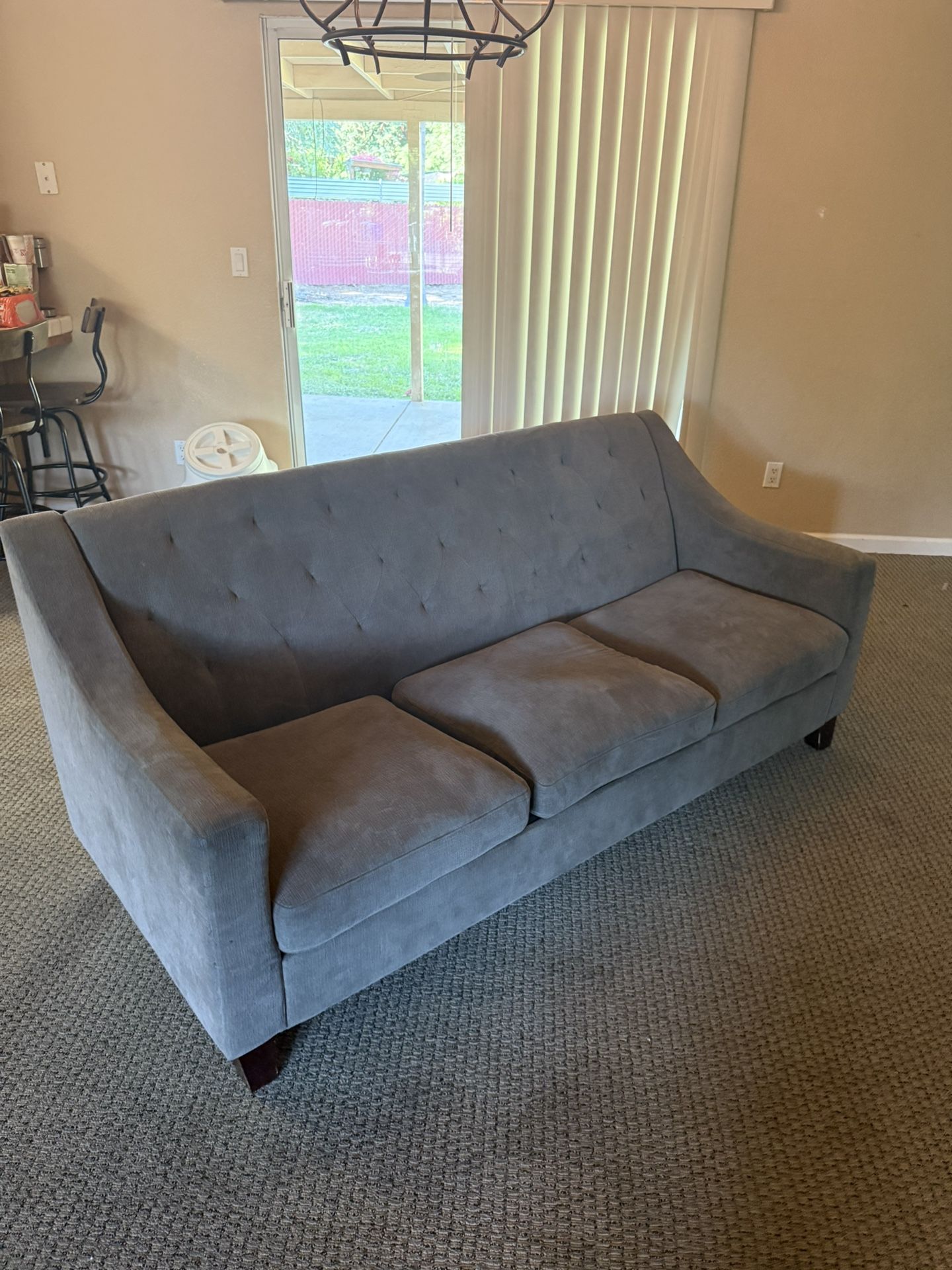 Grey Quilted back couch