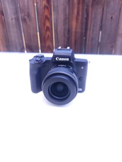 Canon EOS M50 Mark II + 2 Lenses (15-45mm + 55-200mm) + Charger & 4 Batteries Description: Selling my Canon EOS M50 Mark II mirrorless camera in excel