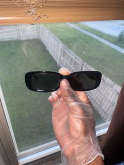 black glasses with black lense