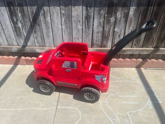 Red step2 ford raptor push car