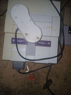 Super Nintendo  system with 3 games all cords controller