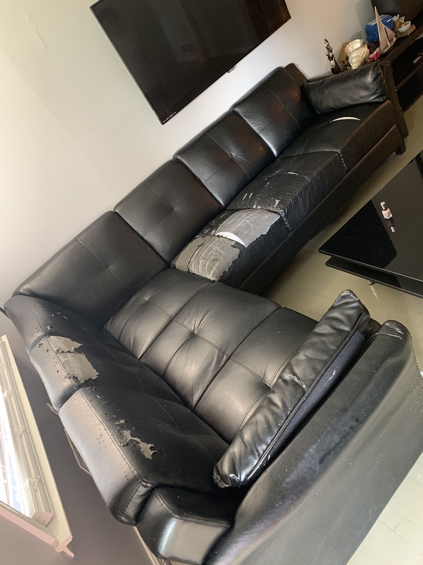 Black leather sectional for FREE