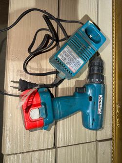 Makita drill with charger