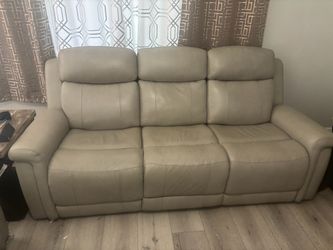 Sofa with Recliner Leather power remote like new !
