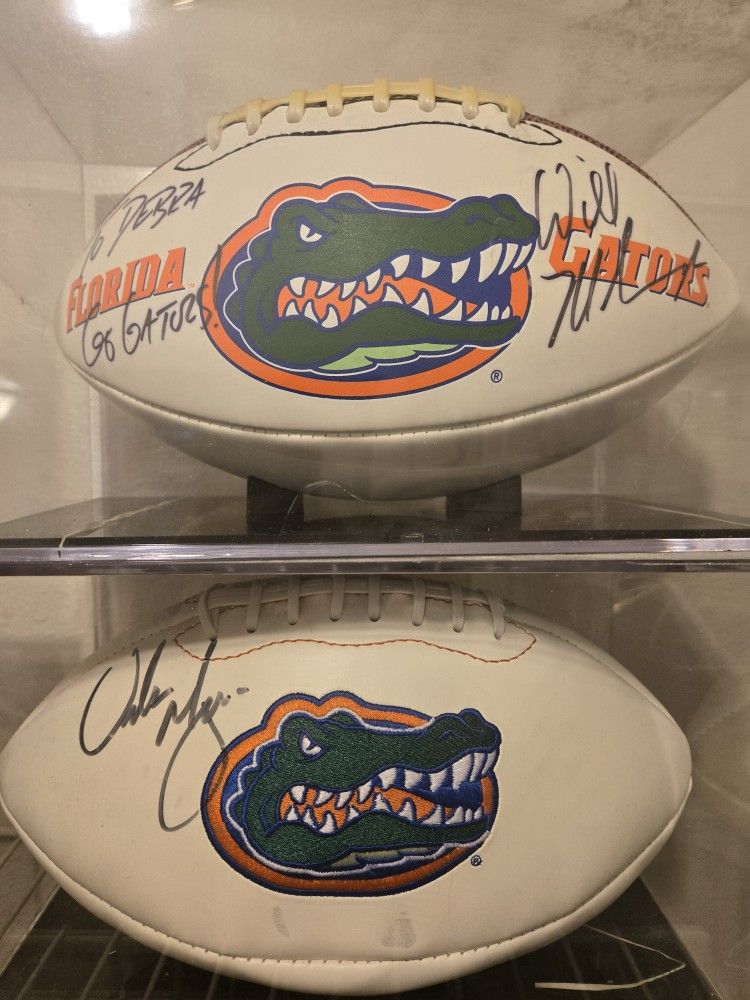Autographed UF Footballs Of Urban Meyer & Will Muschamp