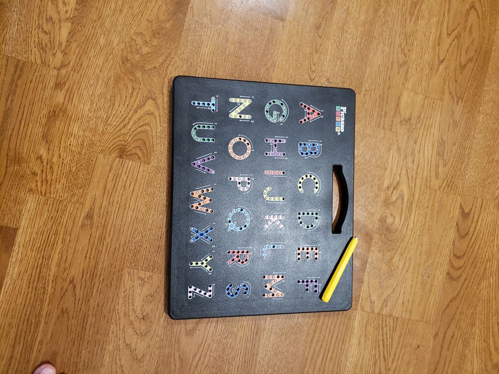 Magnetic alphabet tracing board