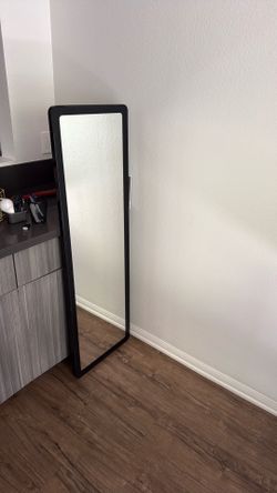 Long black metal mirror