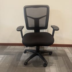 3 black swivel chairs