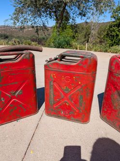 Set of 3 vintage Jerry 5 gallon cans with flexible nozzle